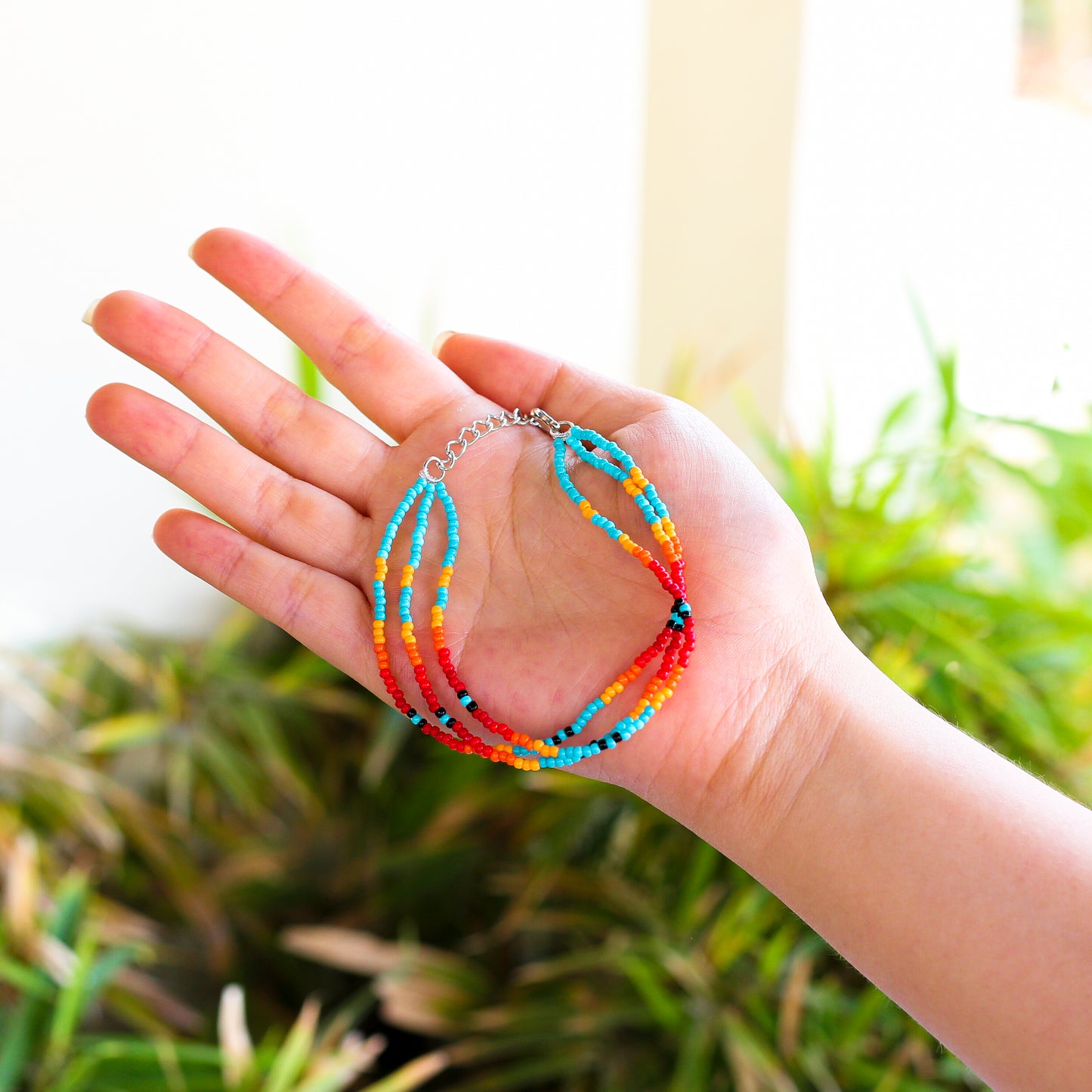 Sunset Glow Beaded Bracelet – Multi-Color Design with Red, Yellow, and Turquoise