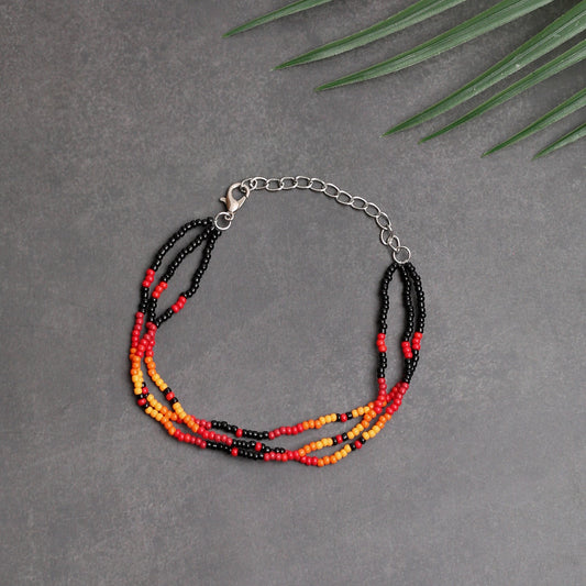 Sunset Harmony Beaded Bracelet – Bold Red, Orange, Yellow, and Black Strands