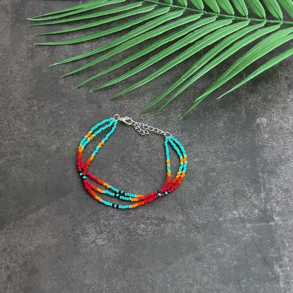 Sunset Glow Beaded Bracelet – Multi-Color Design with Red, Yellow, and Turquoise
